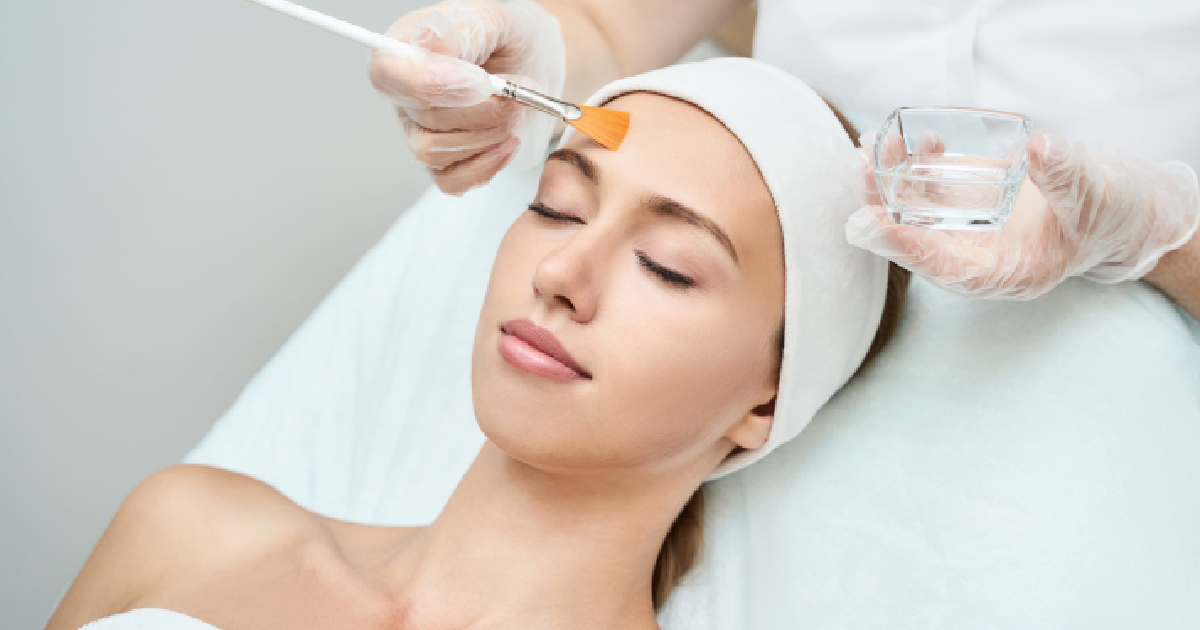 Woman receiving a medical-grade chemical peel treatment in Laredo, TX