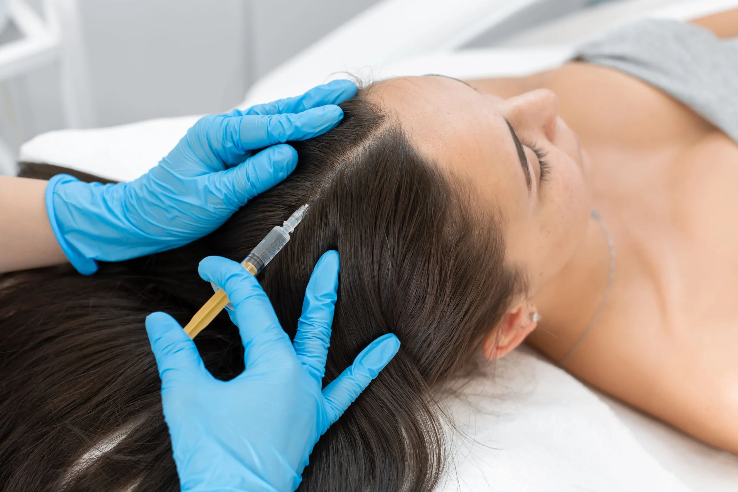 Client receiving Hair Restoration Treatment in Laredo, TX